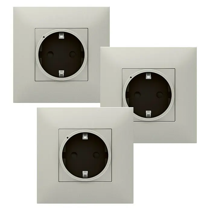 Legrand Valena Next with Netatmo Enchufe x 3 - Aluminio, Plástico, Colocar, 3 ud. - Tres enchufes vacíos en un diseño cuadrado sobre un fondo negro. Los enchufes son modernos y elegantes.