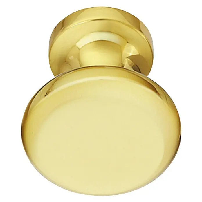 Häfele Pomo para muebles - Tipo de tirador del mueble: Botón, Ø x Al: 16 x 20 mm - Primer plano de un pomo de puerta dorado que refleja la luz, perfecto para diseños interiores elegantes.