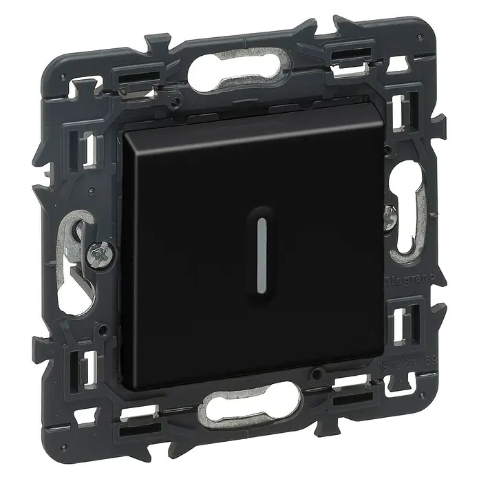 Legrand Valena Next Conmutador con luz - Negro, Plástico, 10 A - Primer plano de un interruptor de luz Legrand en negro, incrustado en un soporte gris, ideal para interiores modernos.