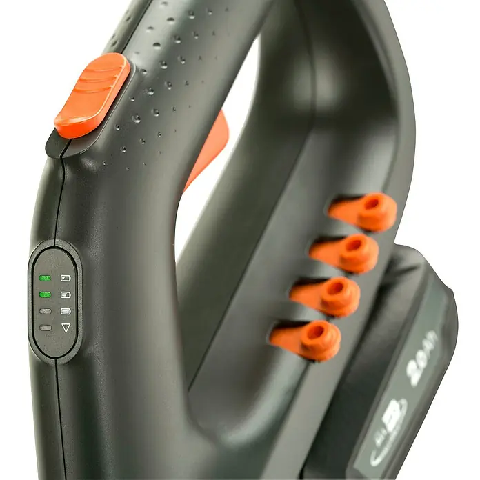 Gardena Power for All 18V Recortabordes de batería EasyCut 23/18V - 18 V, 2 Ah, Iones de litio, 1 batería, Ancho de corte cuchilla: 23 cm - Primer plano de una herramienta de jardín a batería con detalles naranjas e indicador de nivel de carga. Diseño moderno y ergonómico.