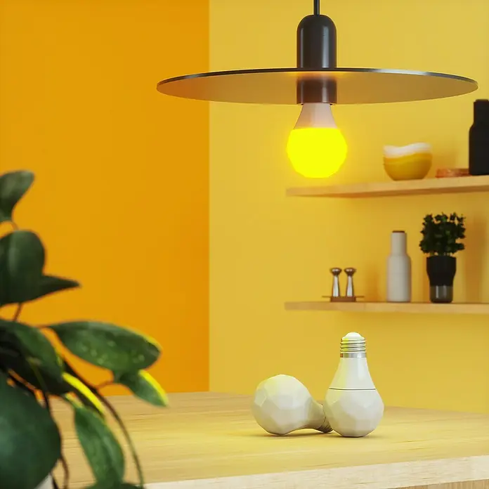 Nanoleaf Smart-LED-Lampen Set Essential E27 - E27, Dimmbarkeit: Dimmbar, RGBW, 806 lm, 9 W, 1 Stk. - Nahaufnahme von LED-Lampen, eine leuchtet hellgelb unter einer modernen Lampe, während andere auf einem Holztisch liegen.