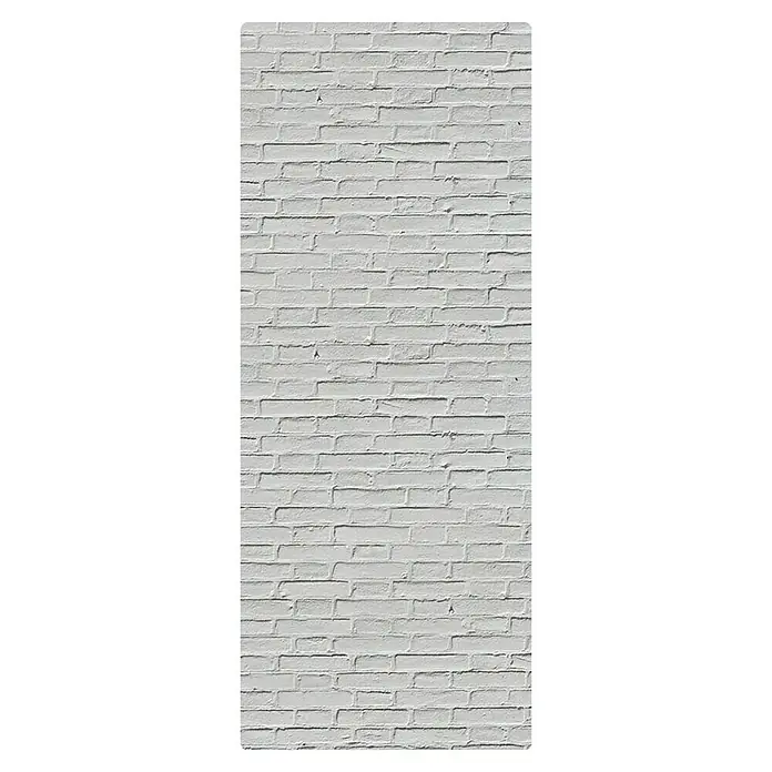 SanDesign Duschrückwandmuster - 17,5 cm x 7 cm x 3 mm, White Brick Wall - Eine vertikale Ansicht einer Backsteinmauer mit klassischem Mauerwerk, die in einem schlichten Weißton gestrichen wurde und die Textur hervorhebt.