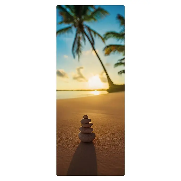 SanDesign Duschrückwandmuster - 17,5 cm x 7 cm x 3 mm, Lonely Beach - Sonnenuntergang am Strand mit einem Steinturm im Vordergrund, der Ruhe und Gelassenheit ausstrahlt.