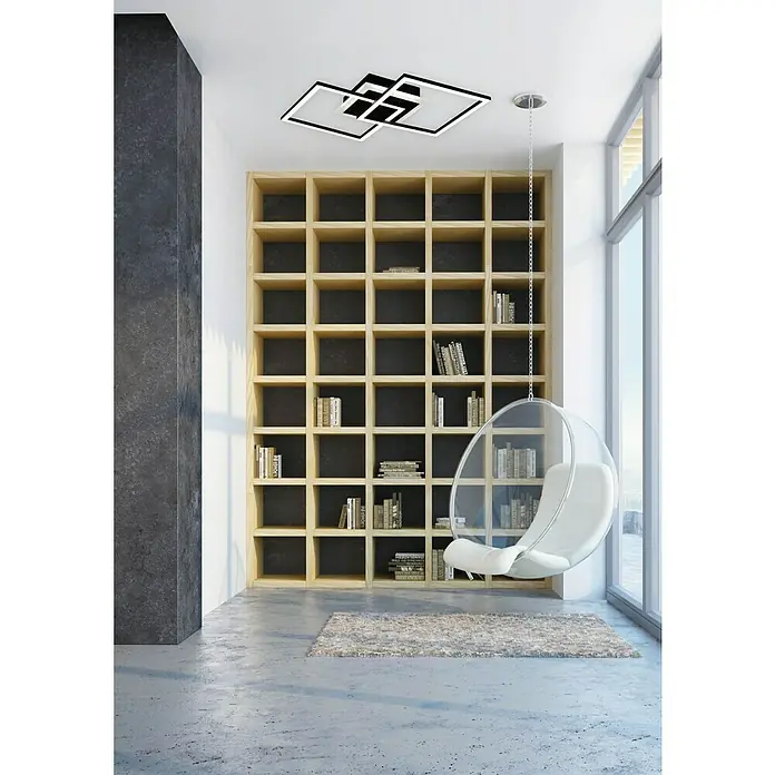 Trio Leuchten LED-Deckenleuchte Venida - 25 W, L x B x H: 57 x 35 x 7 cm, Schwarz, Warmweiß - Lichtdurchflutete Leseecke mit modernem Bücherregal und schwebendem Sessel unter einer stilvollen Deckenleuchte für entspannte Stunden.