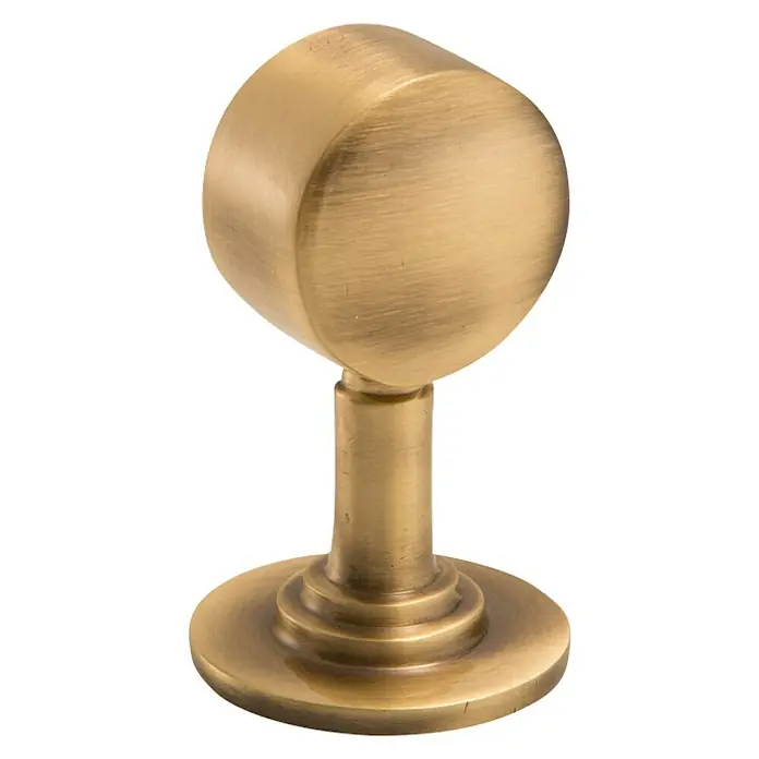 Stabilit Endhalterung - L x B: 75 x 30 mm, Für Seildurchmesser: 30 mm, Bronziert - Nahaufnahme eines goldenen Endknaufs für Gardinenstangen, der durch sein schlichtes Design und die gebürstete Oberfläche besticht.