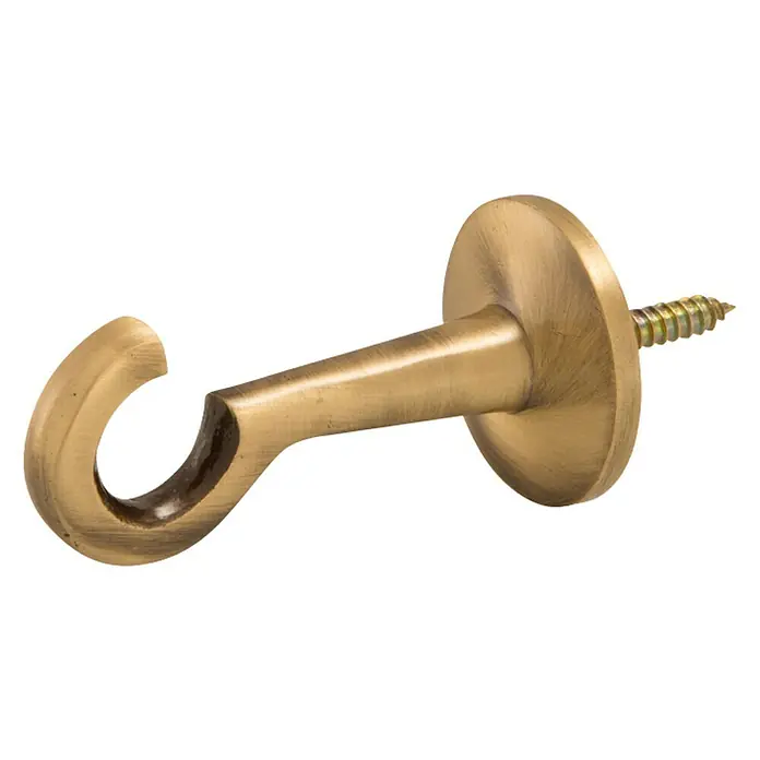 Stabilit EndhakenL x B: 53 x 35 mm, Für Seildurchmesser: 30 mm, Bronziert - Nahaufnahme eines einzelnen goldenen Kleiderhakens mit einer Schraube zur Befestigung an einer Wand.