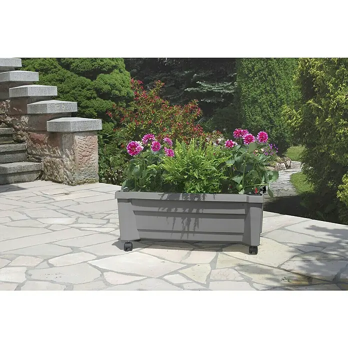 KHW Pflanzkasten mit Spalier - Außenmaß (L x B x H): 79 x 35 x 115 cm, Kunststoff, Grau - Ein grauer Blumenkasten mit bunten Blumen steht auf einem Steinpflaster neben einer Steintreppe.