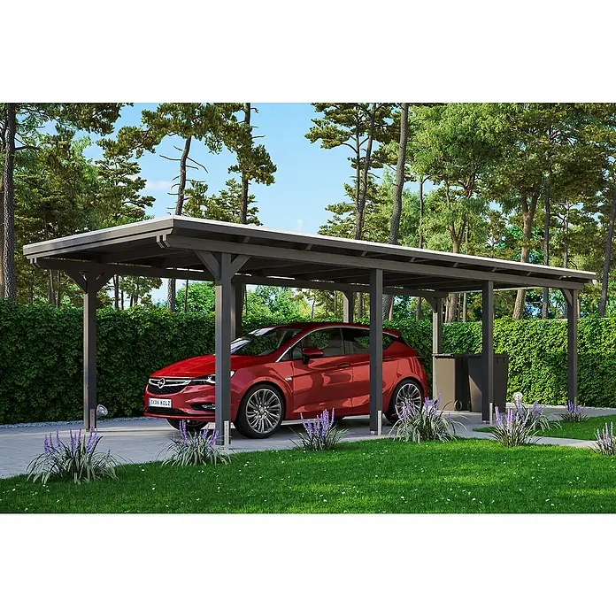 SKAN HOLZ Carport Emsland - Außenmaß inkl. Dachüberstand (B x T): 3,54 x 8,46 m, Einzelcarport, Schiefergrau, Materialspezifizierung Dach: EPDM-Folie, Fichte, Ohne Abstellraum - Ein moderner Carport aus Holz mit einem roten Auto darunter, umgeben von Grünpflanzen. Ideal als stilvoller Wetterschutz für Ihr Fahrzeug.