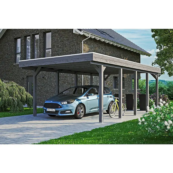 SKAN HOLZ Carport Friesland - Außenmaß inkl. Dachüberstand (B x T): 3,97 x 7,08 m, Einzelcarport, Schiefergrau, Material Dach: Holz - Das Bild zeigt ein Carport aus Holz, das ein blaues Auto schützt und einen Fahrradständer hat. Es fügt sich gut in die Hausumgebung ein.
