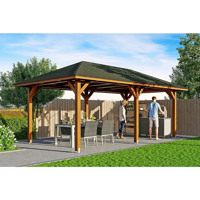 SKAN HOLZ Pavillon Orleans 1 - L x B: 656 x 374 cm, Holz, Nussbaum - Das Bild zeigt einen modernen Holzpavillon mit einem dunklen Dach, der eine einladende Außenküche und einen Essbereich im Garten beschattet.