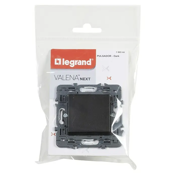 Legrand Valena Next Pulsador - Negro, Brillante, Montaje en la pared - Primer plano de un pulsador Legrand Valena Next en un embalaje transparente, destacando el marco gris y el botón oscuro.