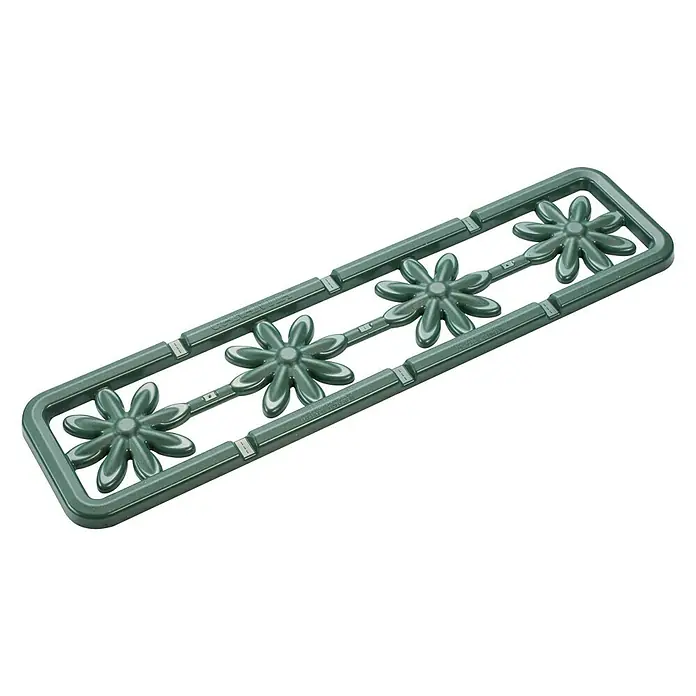 Garantia Wasserspender System Flora - Kunststoff - Nahaufnahme einer grauen Plastikform mit vier Gänseblümchen-Verzierungen, die sich ideal für Bastelprojekte eignet.