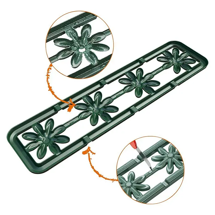 Garantia Wasserspender System Flora - Kunststoff - Ein grünes Kunststoffprodukt mit Blumenmuster, das mit Werkzeugen bearbeitet wird, um die Blumen zu trennen.