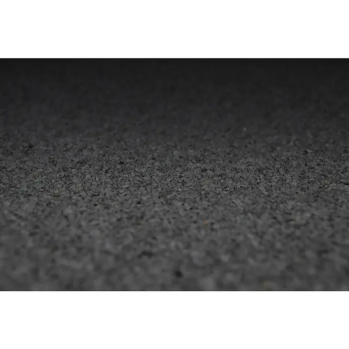 Weka Bitumendachbahn - Anthrazit, Bitumen - Nahaufnahme von Gummifliesen, die für eine sichere und komfortable Oberfläche in Fitnessstudios und Spielbereichen sorgen.