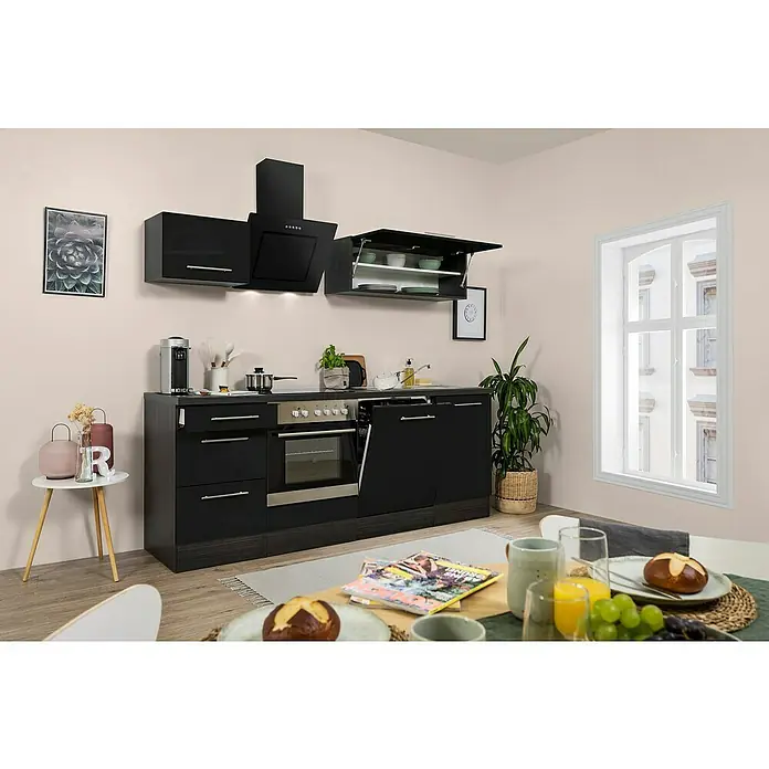 Respekta Premium Küchenzeile RP220ESCBO - Breite: 220 cm, Schwarz, Mit Elektrogeräten - Schwarze Küchenzeile mit Hängeschränken, Dunstabzugshaube und Einbaugeräten wie Backofen und Geschirrspüler, dazu Tisch mit Frühstücksgedecken.
