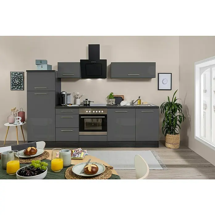 Respekta Premium Küchenzeile RP280EGCBO - Breite: 280 cm, Grau, Mit Elektrogeräten - Helles Kücheninterieur mit grauen Schränken, modernen Geräten und einem Esstisch mit Frühstückszutaten für ein gemütliches Ambiente.