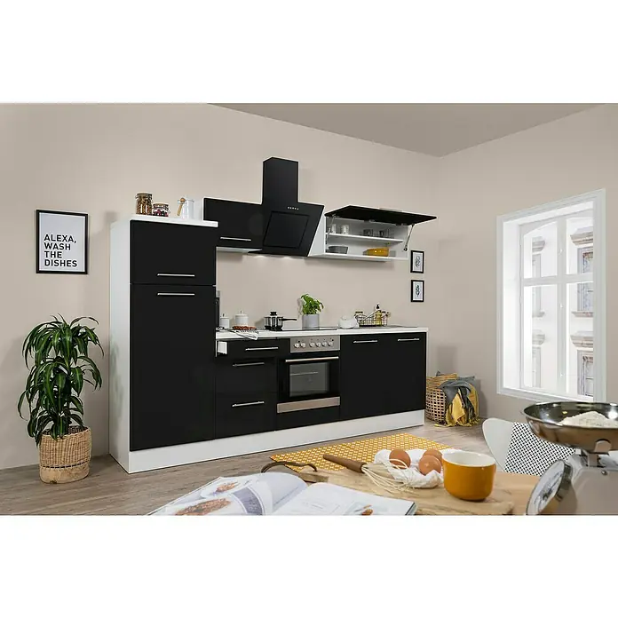 Respekta Premium Küchenzeile RP270WSCBO - Breite: 270 cm, Schwarz, Mit Elektrogeräten - Eine moderne Küche in Schwarz und Weiß mit Elektrogeräten, Dunstabzugshaube und einer Pflanze daneben.