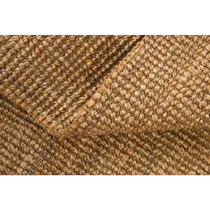 Alfombra de yute Siena - Beige, 200 x 300 cm - Primer plano de una alfombra de sisal texturizada que muestra su tejido grueso y los tonos marrones cálidos y naturales que evocan un ambiente rústico y acogedor.