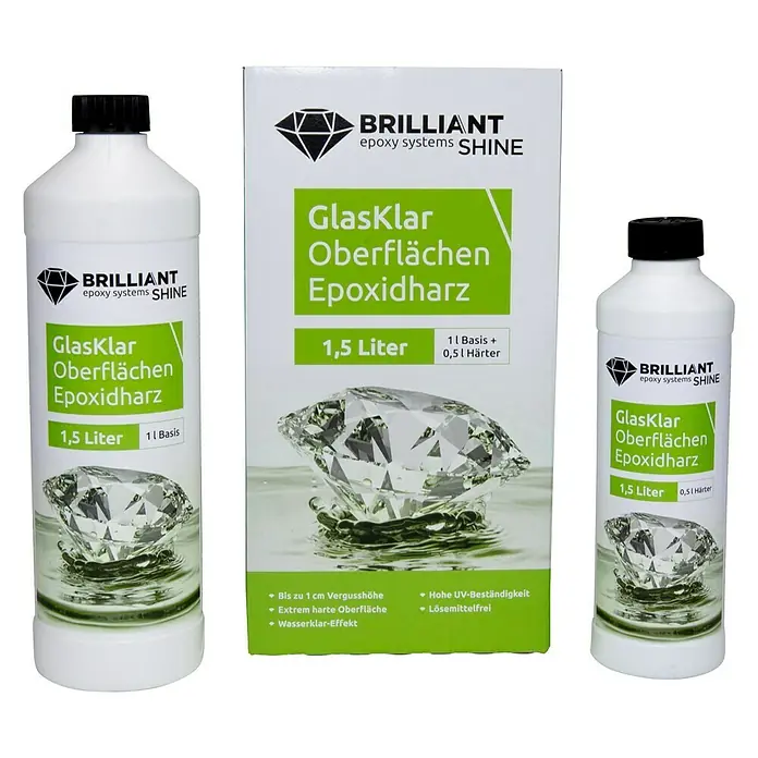 Epoxidharz Oberflächenharz Brilliant Shine - Glasklar, 1,5 l - Produktansicht von Brilliant Shine GlasKlar Oberflächen Epoxidharz in Flaschen und einer Box mit einem Diamantenbild.