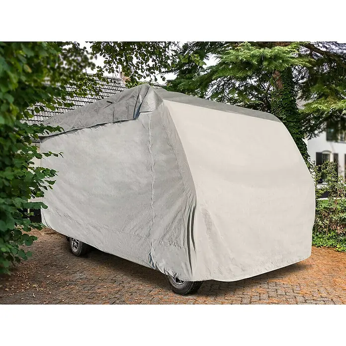 Wohnmobil-Abdeckplane - L x B x H: 650 x 235 x 270 cm, Grau - Ein Wohnwagen ist mit einer grauen Plane abgedeckt, die ihn vor Witterungseinflüssen schützt und für eine lange Lebensdauer sorgt.