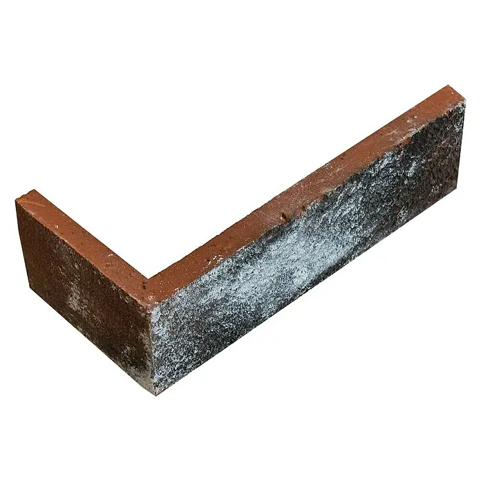 Celina Klinker Verblendstein-Ecke Vintage Charleroi - 21,5 cm x 6,5 cm x 15 mm, Mehrfarbig, Steinoptik - Detailaufnahme eines L-förmigen Ecksteins aus rotem Backstein mit weißer Ausblühung, ideal für architektonische Anwendungen.