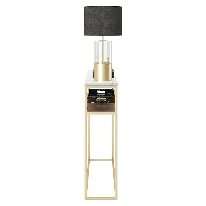 Phönix Playboy Beistelltisch Candy - L x B x H: 30 x 105 x 95 cm, Gold - Eine stilvolle Konsole mit Marmorplatte, goldenem Gestell, Schubladen und einer modernen Lampe mit schwarzem Schirm.