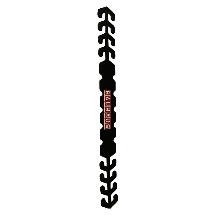 BAUHAUS Cinta salvaorejas - Largo: 20 cm, Apto para: Media mascarilla - Vista detallada de un logotipo de Bauhaus situado sobre una superficie decorativa oscura, destacando su diseño icónico. La imagen destaca la estética del logo.