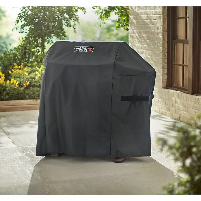 Weber Grill-Schutzhülle - Passend für: Weber Spirit 200/300 Serie - Das Bild zeigt eine Weber Grillabdeckung in Schwarz. Sie schützt den Grill vor Witterungseinflüssen und hält ihn sauber.