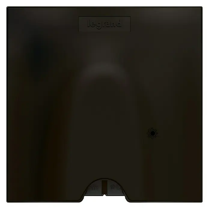 Legrand Valena Next Pasacables - Negro, Diámetro: 12 cm - La imagen muestra un producto Legrand oscuro y cuadrado, probablemente una tapa o carcasa, con el logo visible.