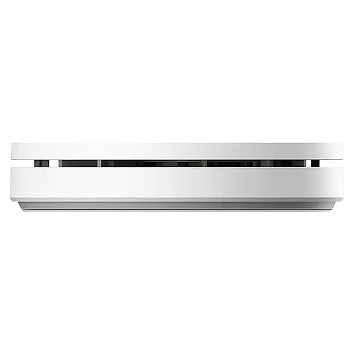 UniTEC Rauchwarnmelder Design - Durchmesser: 12,5 cm, Höhe: 2,5 mm, Alarmsignal: 85 dB, Weiß - Nahaufnahme eines weißen Rauchmelders. Er hat eine horizontale Bauweise mit einer dunklen Sensorreihe in der Mitte.
