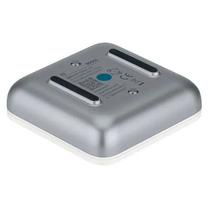 Bosch Smart Home Funk-Wassermelder - Batteriebetrieben, 75 x 75 x 25 mm - Nahaufnahme der Unterseite eines Bosch Smart Home Geräts mit technischen Details und Firmeninformationen.