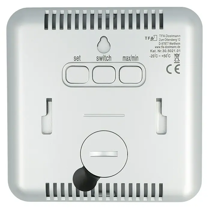 TFA Dostmann Thermo-Hygrometer Style - Breite: 10,5 cm - Rückansicht eines TFA Dostmann Produkts mit Lüftungsschlitzen, Knöpfen und Batteriefach.