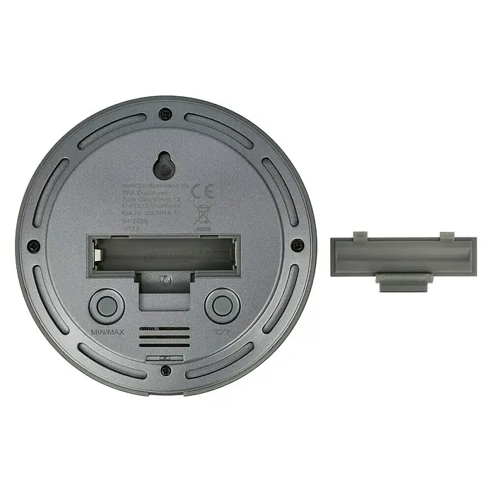 TFA Dostmann Thermo-Hygrometer Cosy - Durchmesser: 10,4 cm - Rückansicht eines runden Hygrometers mit Batteriefach, Tasten und CE-Kennzeichnung zur Feuchtigkeitsmessung im Innenbereich.