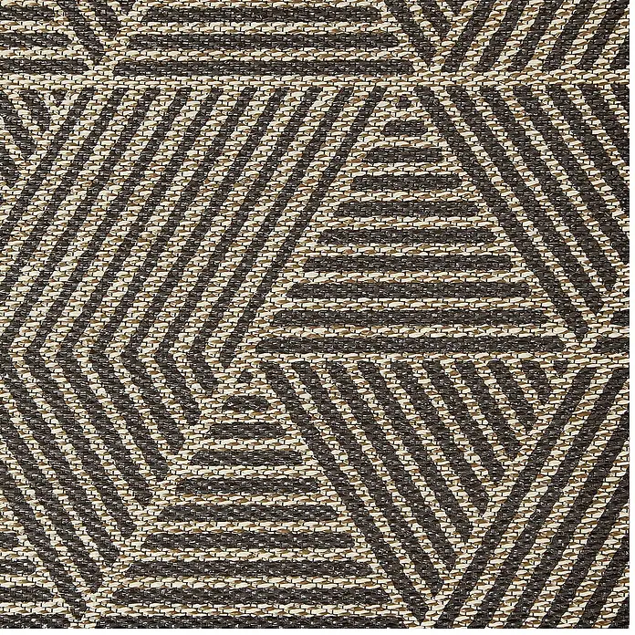 Alfombra de vinilo Living Geométrica - Beige/Marrón, 290 x 200 cm - Primer plano de una alfombra con un patrón triangular abstracto en tonos marrones y beige, mostrando un tejido texturizado.