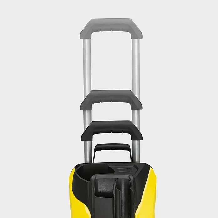 Kärcher Hidrolimpiadora de alta presión K5 Power Control - 145 bar, 2.100 W, Capacidad de bombeo: 500 l/h - Primer plano de una hidrolimpiadora Kärcher amarilla y negra con un asa telescópica en varias etapas de extensión sobre un fondo neutro.