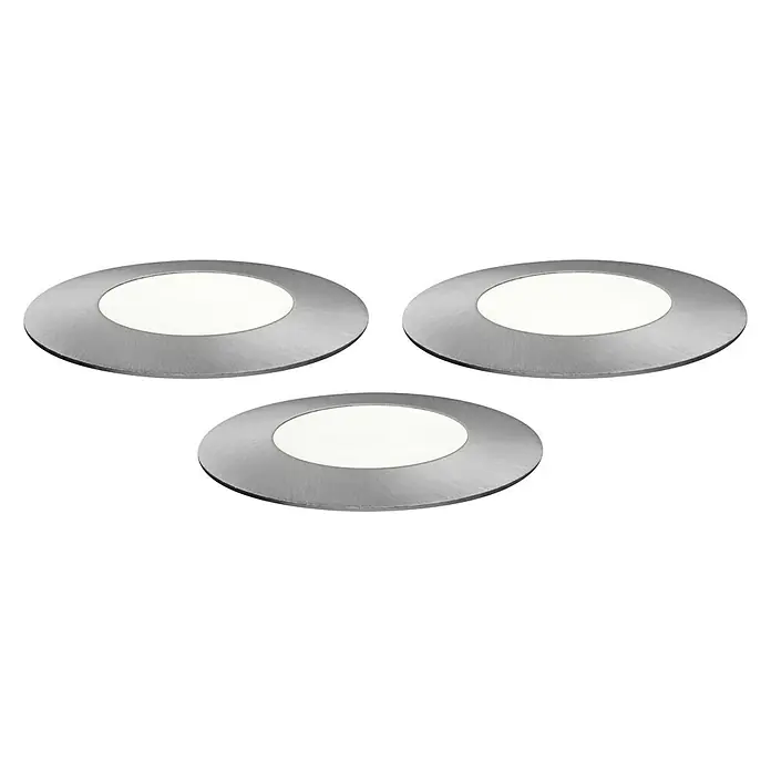 Paulmann Plug & Shine LED-Gartenspot Floor Mini - 2,5 W, 24 V, IP65 - Drei runde LED-Einbauleuchten mit silbernem Rahmen und hellem, diffusem Lichtschein auf schwarzem Hintergrund.