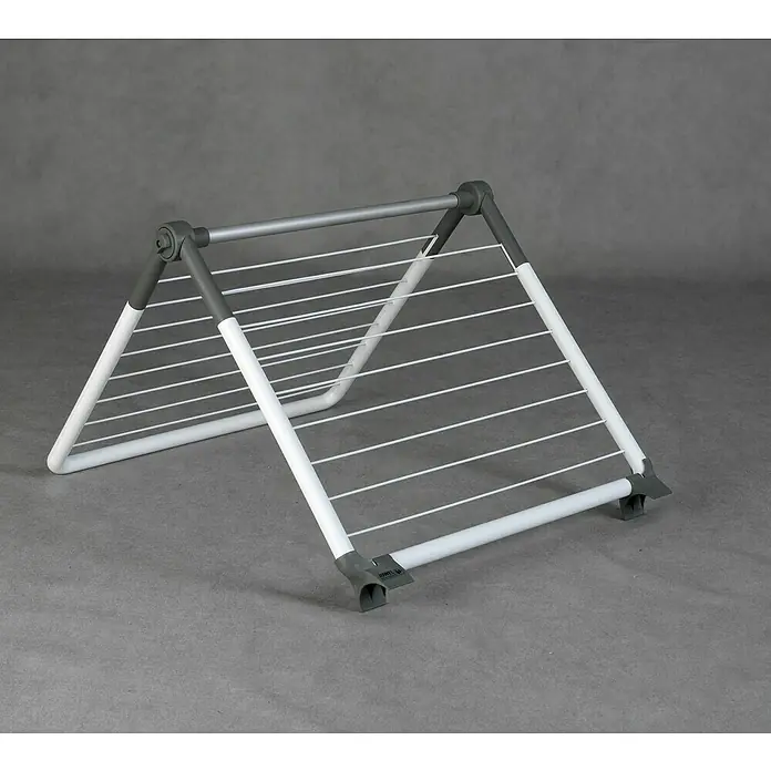 Juwel Stand-Wäscheständer SuperDry Wing - Länge Wäscheleine: 8,8 m, L x B x H: 103,1 x 60,1 x 7,1 cm, Weiß/Obsidian Grey - Ein zusammenklappbarer Wäscheständer mit grauem Gestell und weißen Stäben zum Trocknen von Wäsche.