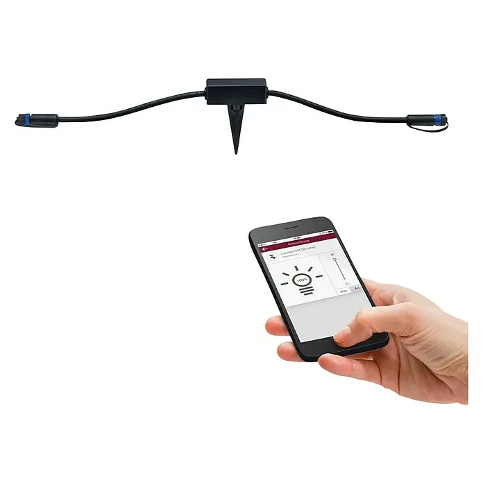 Paulmann Plug & Shine Controlador de intensidad y conmutación - Potencia máx.: 75 W - Iluminación inteligente de jardín con control por smartphone. La imagen muestra una pieza de distribución con cables y una mano sujetando un smartphone.