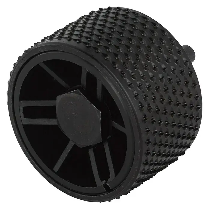 Wolfcraft Rotor-Raspel - Arbeitsdurchmesser: 52 mm - Nahaufnahme eines schwarzen Schleifwerkzeugs mit pyramidenförmigen Noppen auf einer schwarzen Oberfläche.