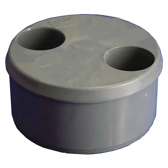 Tecnoagua Tapón PVC reducción doble M-H - 40 mm - Recipiente redondo gris con dos aberturas en la parte superior, ideal para guardar objetos pequeños o material de oficina.