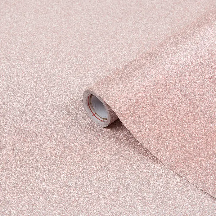 D-c-fix Metalleffektfolie Metallic Glitter - 200 x 67,5 cm, Rosa/Glitzer, Selbstklebend - Nahaufnahme einer Rolle rosa Glitzer-Dekorfolie, ideal für Bastelprojekte und kreative Wandgestaltungen.