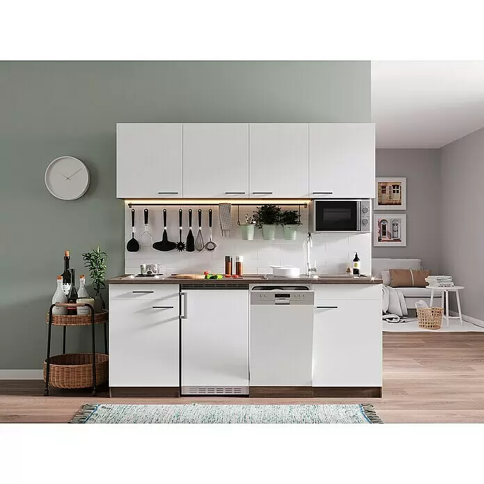 Respekta Singleküche Oliver - Breite: 195 cm, Weiß, Mit Duo-Kochmulde und Mikrowelle - Moderne weiße Küchenzeile mit dunkler Holzplatte, integrierter Spüle, Kochfeld, Mikrowelle, Kühlschrank und Geschirrspüler in einem Wohnraum.