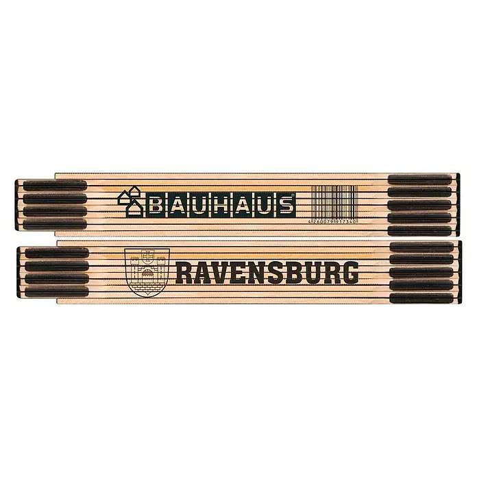 BAUHAUS Zollstock - RAVENSBURG - Zollstock mit den Aufdrucken "BAUHAUS" und "RAVENSBURG", ein nützliches Werkzeug für Handwerker und Heimwerker.