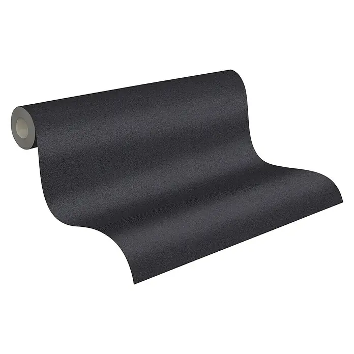 A.S. Création New Elegance Vliestapete - Schwarz, Uni, 10,05 x 0,53 m - Nahaufnahme einer Rolle graphitgrauer Tapete mit feiner Struktur, die eine moderne und elegante Wandgestaltung ermöglicht.