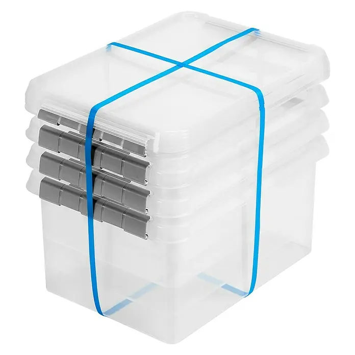 Sunware Aufbewahrungsbox-Set Comfortline 4er Set - L x B x H: 400 x 500 x 260 mm, Transparent - Vier transparente Aufbewahrungsboxen mit Deckel sind mit einem blauen Band zusammengebunden. Die Boxen haben graue Verschlüsse.
