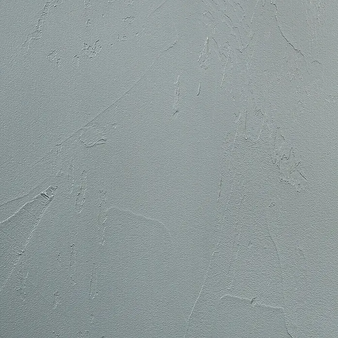 SCHÖNER WOHNEN-Farbe Betondesign-Optik Versiegelung - Grau, 1 l, Passend für: SCHÖNER WOHNEN-Farbe Betondesign-Optik Flächenspachtel - Nahaufnahme einer hellgrauen Betonwand mit unebener Textur, die eine moderne und industrielle Ästhetik vermittelt.