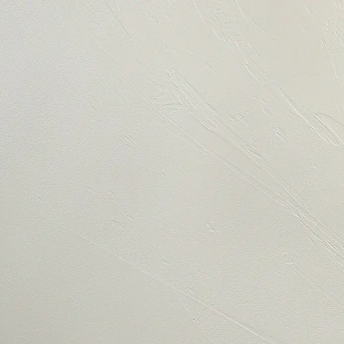 SCHÖNER WOHNEN-Farbe Betondesign-Optik Dekoputz-Set - 3 -tlg., Beige - Eine Nahaufnahme einer strukturierten, hellgrauen Oberfläche, die eine subtile und elegante Textur für Hintergründe oder Designelemente bietet.