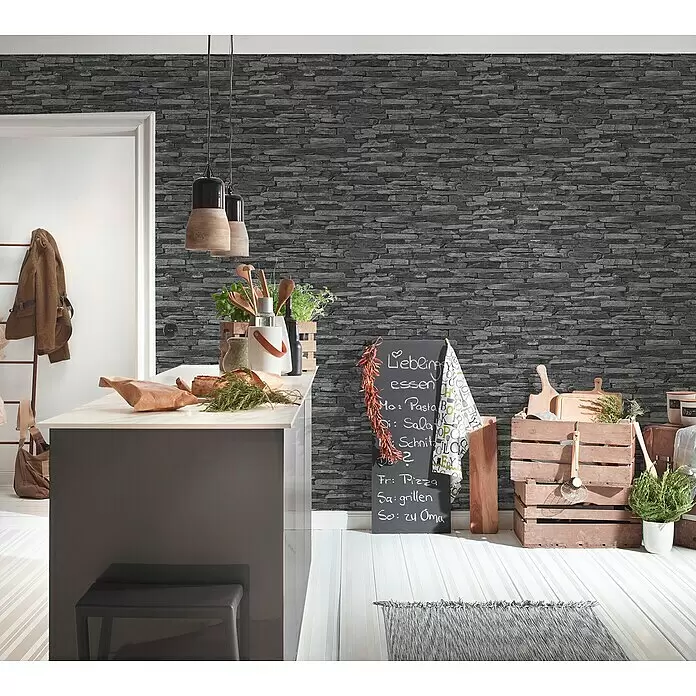 A.S. Création Elements Vliestapete Bruchsteinmauer - Grau/Schwarz, Steinoptik, 10,05 x 0,53 m - Dunkelgraue Tapete in Steinoptik an einer Wand in einer modernen Küche. Sie verleiht dem Raum einen rustikalen Touch.