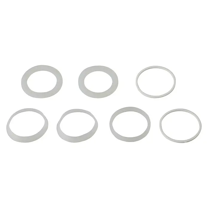 Dichtungssortiment - 1 ½″, 7 Stk., Gummi, Geeignet für: Spültischsiphons - Nahaufnahme von sieben weißen Dichtungsringen auf schwarzem Hintergrund, ideal für Sanitär- oder Reparaturarbeiten.