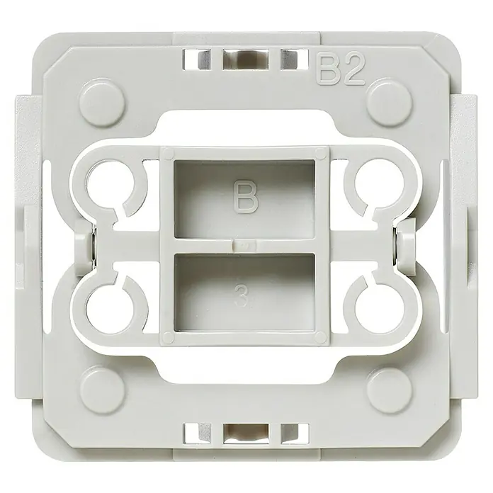 Homematic IP Adapter EQ3-ADA-B2 - 20 Stk., Passend für: Berker-Schalter S1/Modul2/B1/B3/B7/Q1/Q3/Q7 - Nahaufnahme einer weißen Montageplatte für elektronische Komponenten mit rechteckigen und runden Aussparungen.